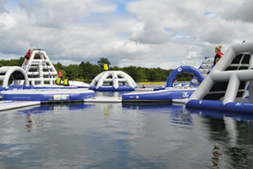 Inflatable obstacle course floating on a lake